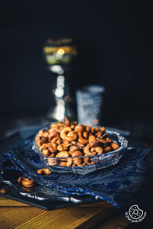 <p>These Spicy Roasted Cashew Nuts aka Masala Kaju are a quick and straightforward snack to throw together. Raw cashews are mixed with some powdered spices such as black pepper and chili and roasted to crunchy perfection. </p><p><strong>Get the recipe here: <a href="https://www.mygingergarlickitchen.com/masala-kaju/" rel="nofollow noopener" target="_blank" data-ylk="slk:Masala Cashews;elm:context_link;itc:0;sec:content-canvas" class="link ">Masala Cashews</a></strong></p>