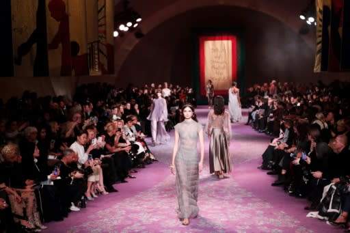 Temple to womanhood: Guests entered the Dior haute couture show through the stylised vulva of a mother goddess created by artist Judy Chicago