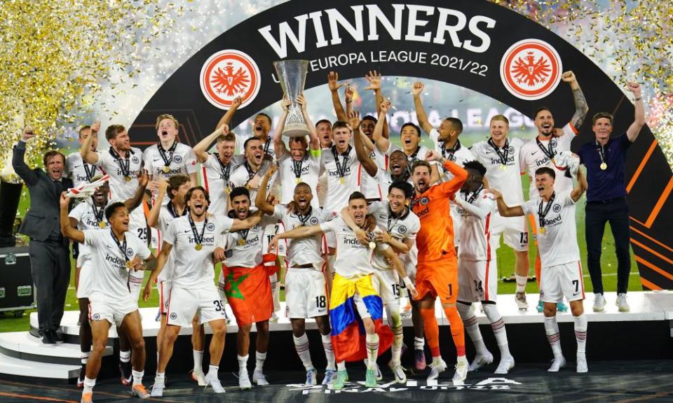 Eintracht Frankfurt celebrate in front of their sizeable support.