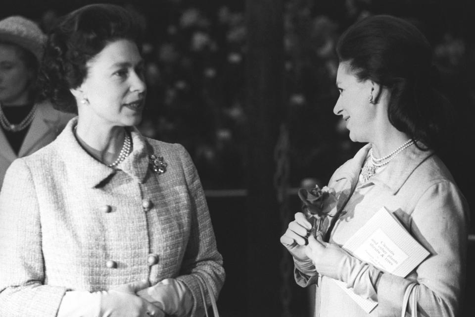 Queen Elizabeth II and Princess Margaret at the Chelsea Flower Show.   (Photo by PA Images via Getty Images)