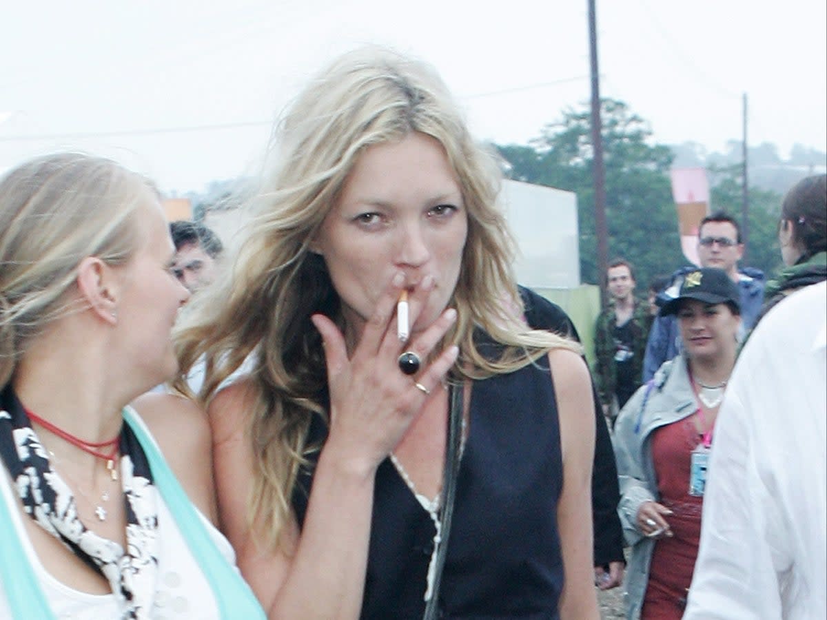 Kate Moss, once rarely seen without a cigarette in hand, now rarely smokes (Getty)