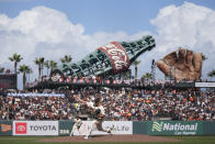 San Francisco Giants pitcher Jordan Hicks works against the San Diego Padres during the seventh inning of a baseball game in San Francisco, Friday, April 5, 2024. (AP Photo/Eric Risberg)