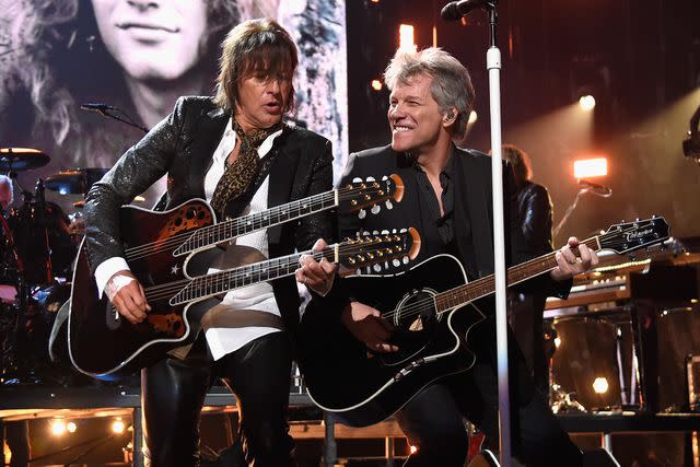 <p>Kevin Mazur/Getty</p> Bon Jovi's Richie Sambora and Jon Bon Jovi