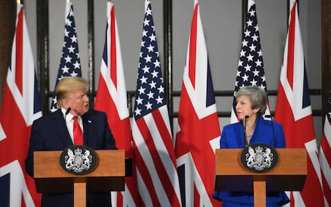 Donald Trump and Theresa May at the joint press conference - Credit: PA