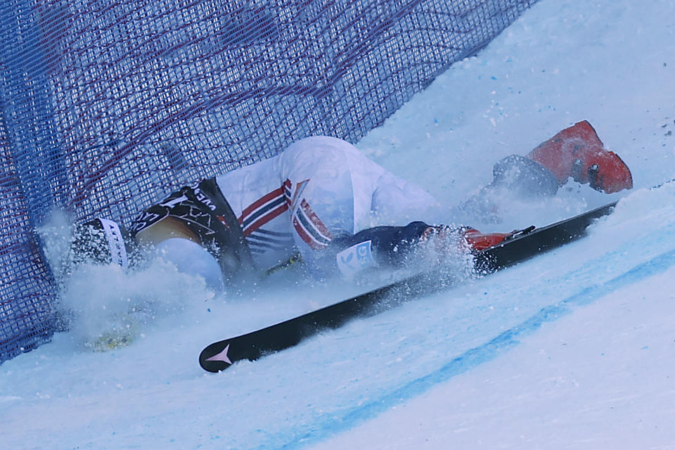 Norway's Aleksander Aamodt Kilde falls during an alpine ski, men's World Cup downhill race, in Wengen, Switzerland, Saturday, Jan. 13, 2024. (AP Photo/Alessandro Trovati)