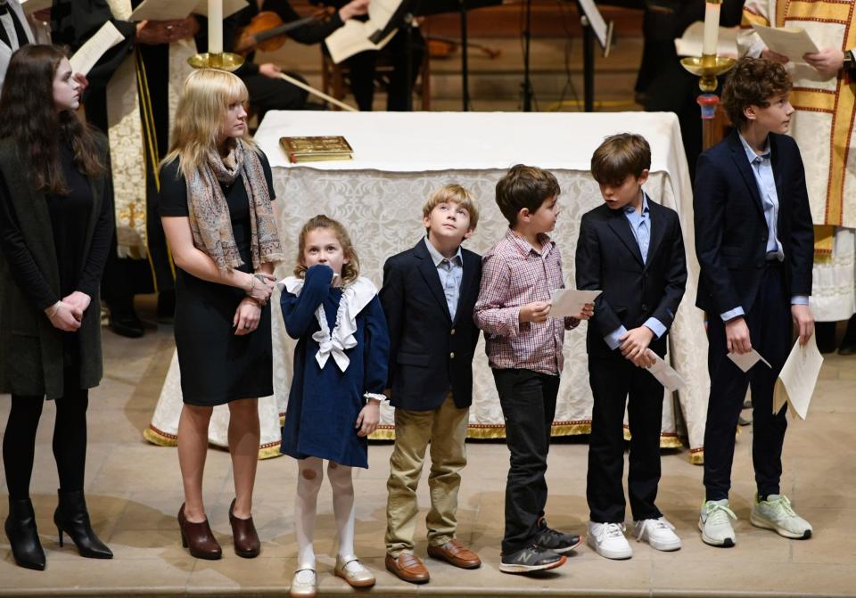 Grandchildren of former first lady of Tennessee Honey Alexander wait to read scripture during her memorial service at Christ Church Cathedral in Nashville, Tenn., Saturday, Dec. 10, 2022.