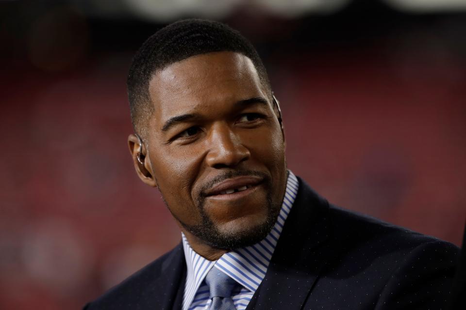 FILE - This Jan. 19, 2020 file photo shows Michael Strahan before the NFL NFC Championship football game between the San Francisco 49ers and the Green Bay Packers in Santa Clara, Calif. Strahan will be among the crew on Blue Origin's next flight to space.