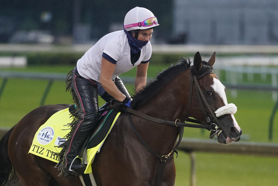 Exercise rider Heather Smullen rides Kentucky Derby entry Tiz the Law during a workout at Churchill Downs, Wednesday, Sept. 2, 2020, in Louisville, Ky. (AP Photo/Darron Cummings)