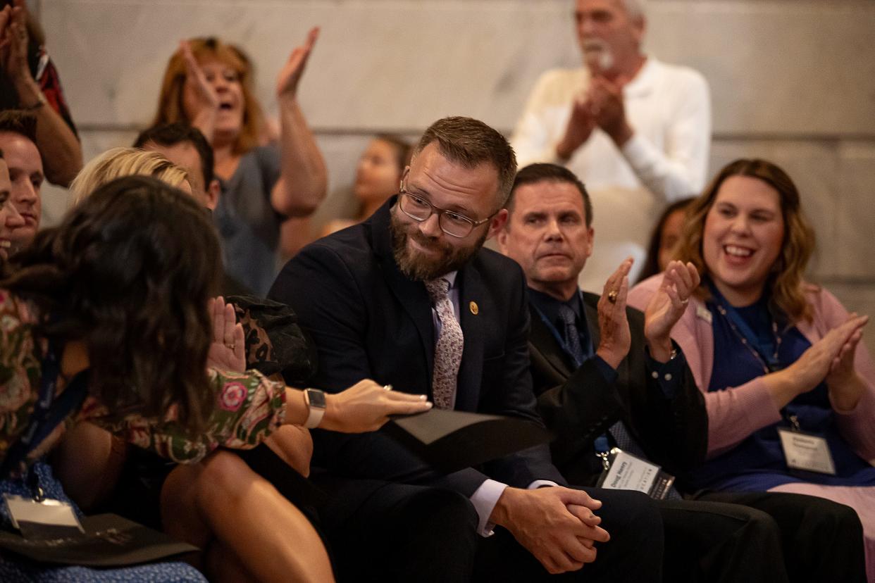 Boone County's Kevin Dailey, who teaches social studies at Ballyshannon Middle School reacts after being named the 2023 Kentucky Teacher of the Year during a ceremony in Frankfort on Wednesday morning, Sept. 13, 2023