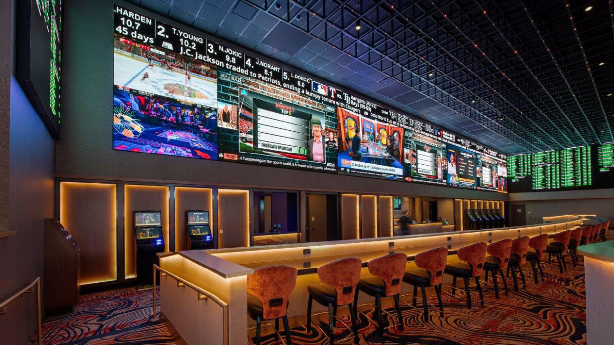  A Planar 129-foot-long continuous LED display brings action to sports bettors. . 