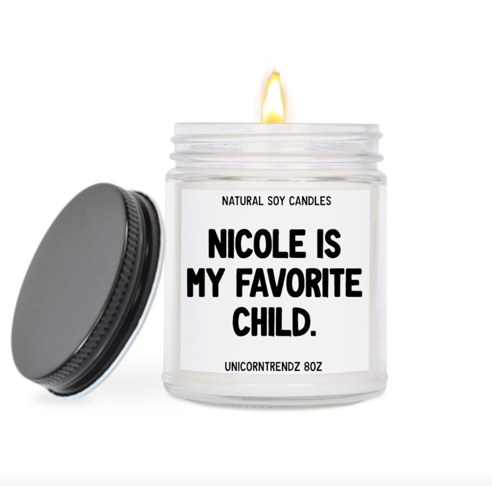 Custom Favourite Child Candle with black text on white background (Photo via Etsy)