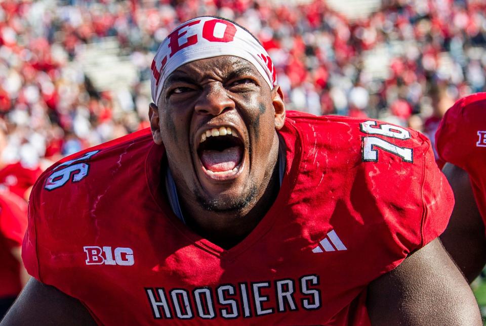 Matthew Bedford (76) celebrates after defeating the Wisconsin in November 2023 in  Bloomington, Indiana. Bedford transferred from Indiana to Oregon this season.