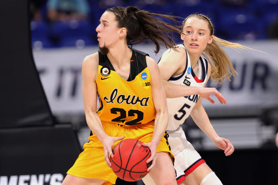 UConn's Paige Bueckers and Iowa's Caitlin Clark have only met once on the court in their college careers. (Carmen Mandato/Getty Images)