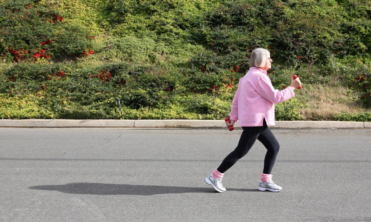 <span>Short bursts of backwards walking, incorporated into a regular exercise routine, may help to prevent falls.</span><span>Photograph: Allison Michael Orenstein/Getty Images</span>