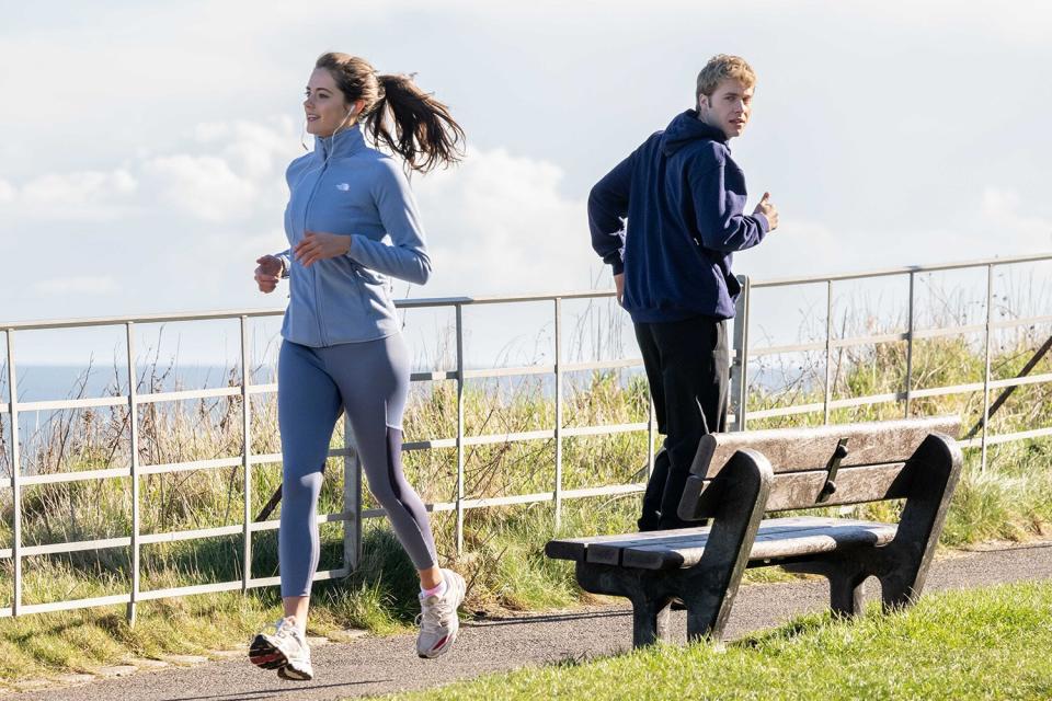 EXCLUSIVE: Prince William actor Ed McVey and Meg Bellamy's Kate Middleton film a scene for Netflix' series The Crown near St Andrews, Scotland