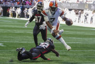 Cleveland Browns quarterback Jacoby Brissett (7) leaps for a touchdown during the first half of an NFL football game, Sunday, Oct. 2, 2022, in Atlanta. (AP Photo/John Bazemore)