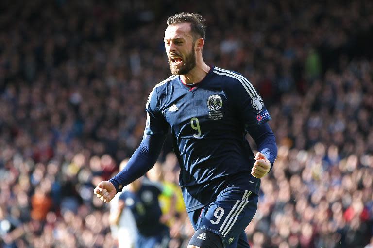 Scotland striker Steven Fletcher celebrates after scoring their second goal during the Euro 2016 qualifying match against Gibraltar at Hampden Park on March 29, 2015