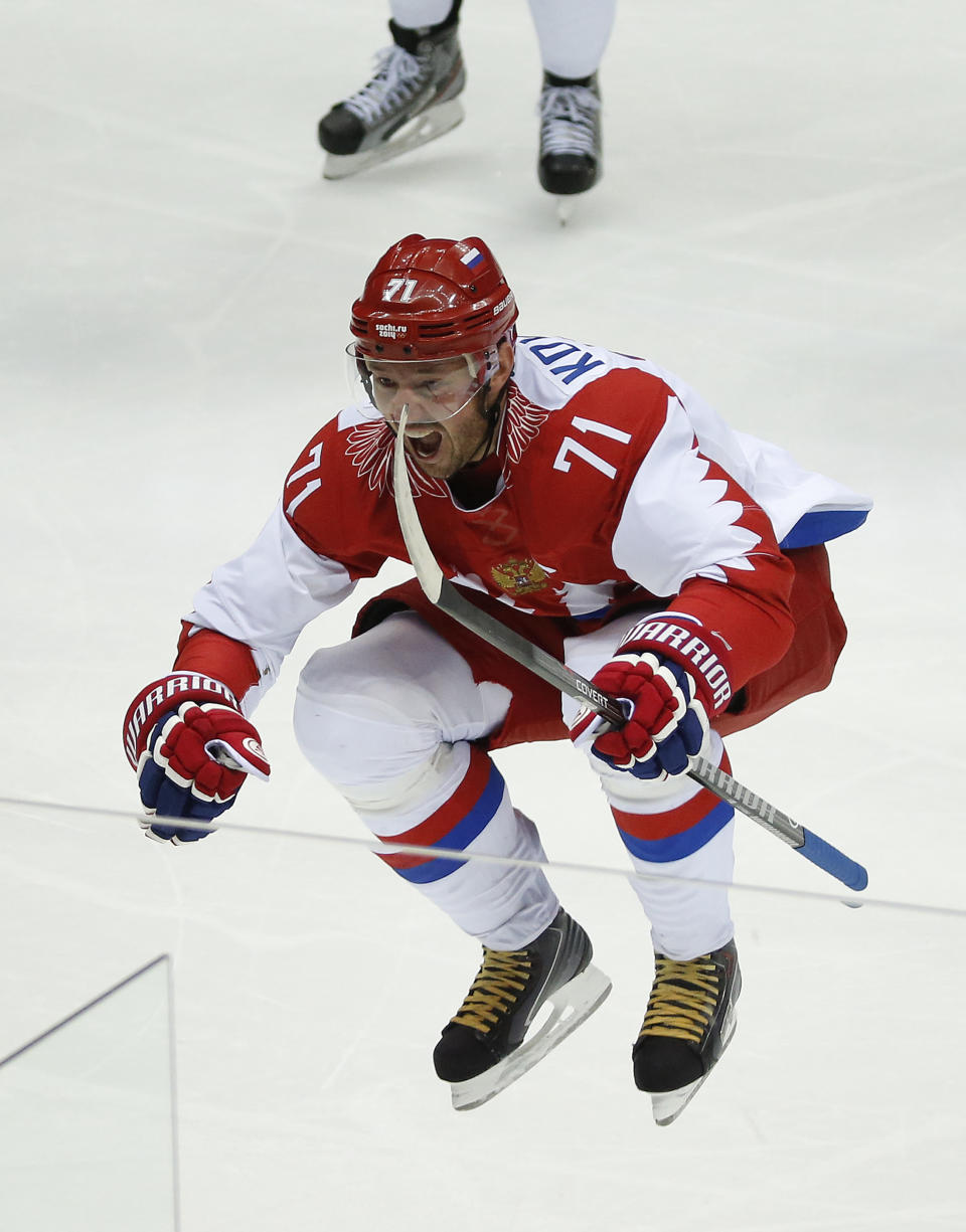 Russia forward Ilya Kovalchuk reacts after scoring a goal against Finland during the first period of a men's quarterfinal ice hockey game at the 2014 Winter Olympics, Wednesday, Feb. 19, 2014, in Sochi, Russia. (AP Photo/Mark Humphrey)