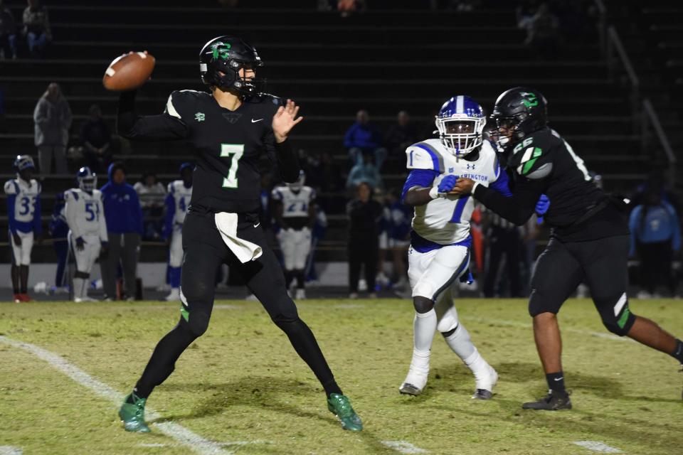 Choctawhatchee High School quarterback Jesse Winslette looks for an open receiver during a home game against Booker T. Washington High School on Friday, Oct. 21, 2022.