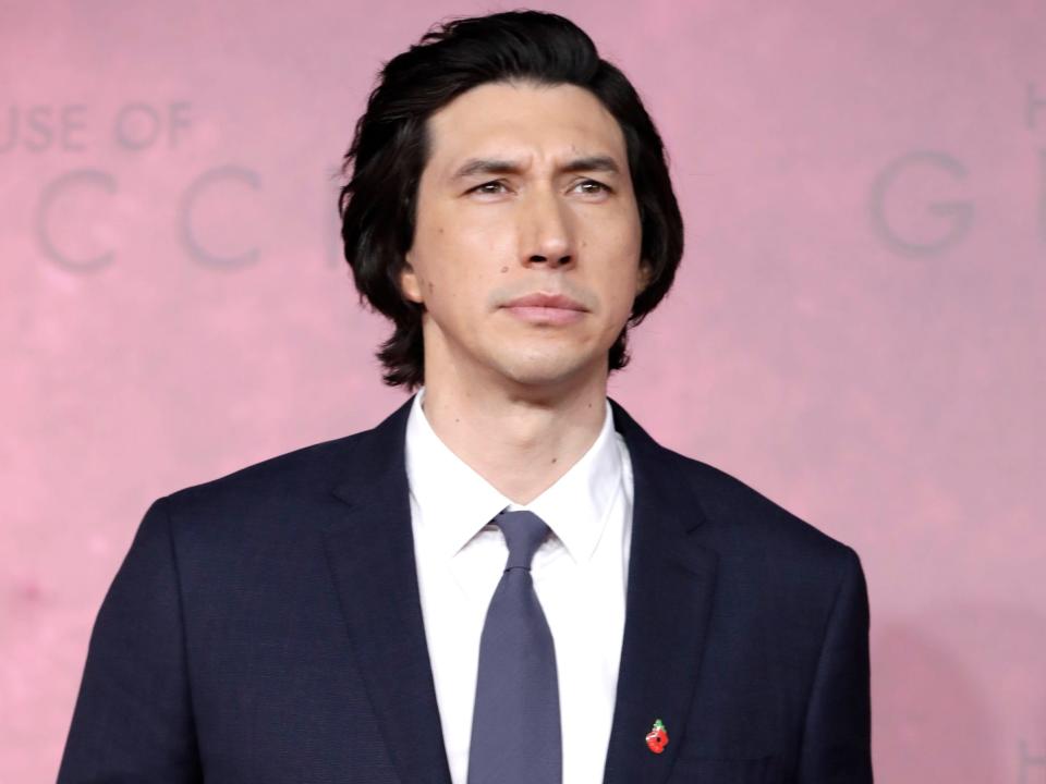 Adam Driver in a dark suit