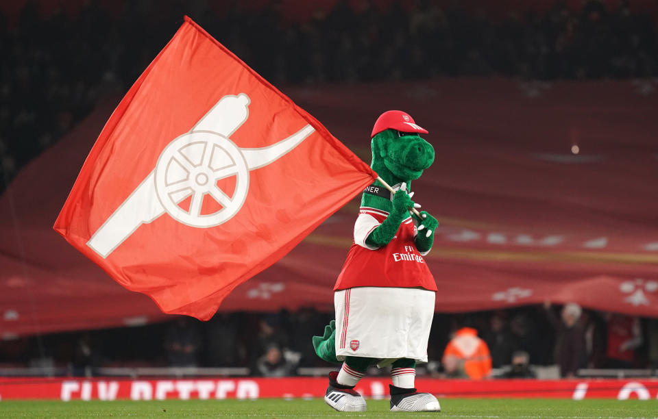 Out-of-favor Arsenal midfielder Mesut Özil is nevertheless offering to pay the full salary for club mascot Gunnersaurus as long as he's an Arsenal player. (Photo by John Walton/PA Images via Getty Images)