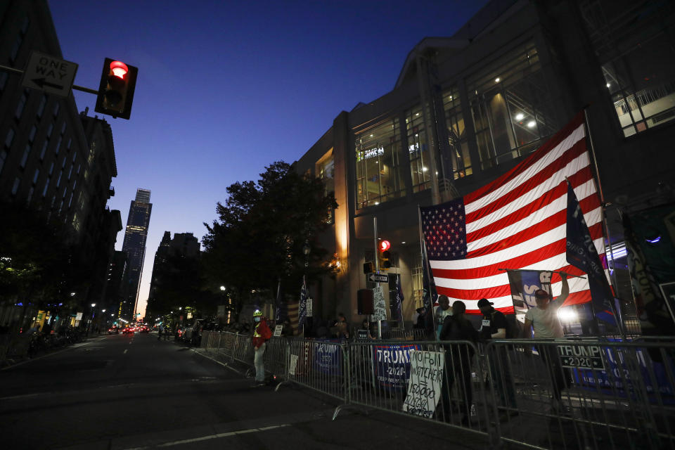 Supporters of President Donald Trump protest outside the Pennsylvania Convention Center in Philadelphia, Sunday, Nov. 8, 2020, a day after the 2020 election was called for Democrat Joe Biden.(AP Photo/Rebecca Blackwell)