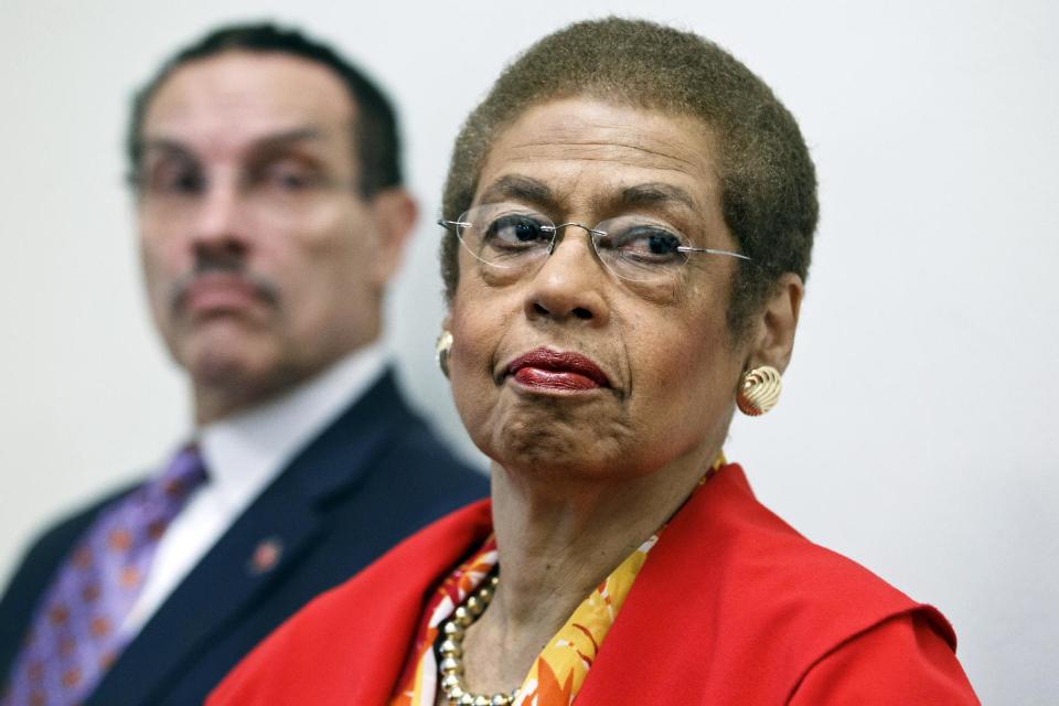 FILE - In this May 29, 2012 file photo, Del. Eleanor Holmes Norton, D-D.C., a non-voting delegate in the House of Representatives, right, accompanied by Washington Mayor Vincent Gray, take part in a news conference on Capitol Hill in Washington. Some District of Columbia leaders say they’re disappointed that President Barack Obama hasn’t been more of an advocate for local autonomy in his first term. Obama carried the district in 2008 with 92 percent of the vote, an unusually high percentage even in this overwhelmingly Democratic city. The president also hasn’t appeared in public with Mayor Vincent Gray since the mayor took office. The mayor’s 2010 campaign is the subject of a wide-ranging federal investigation. (AP Photo/J. Scott Applewhite, File)