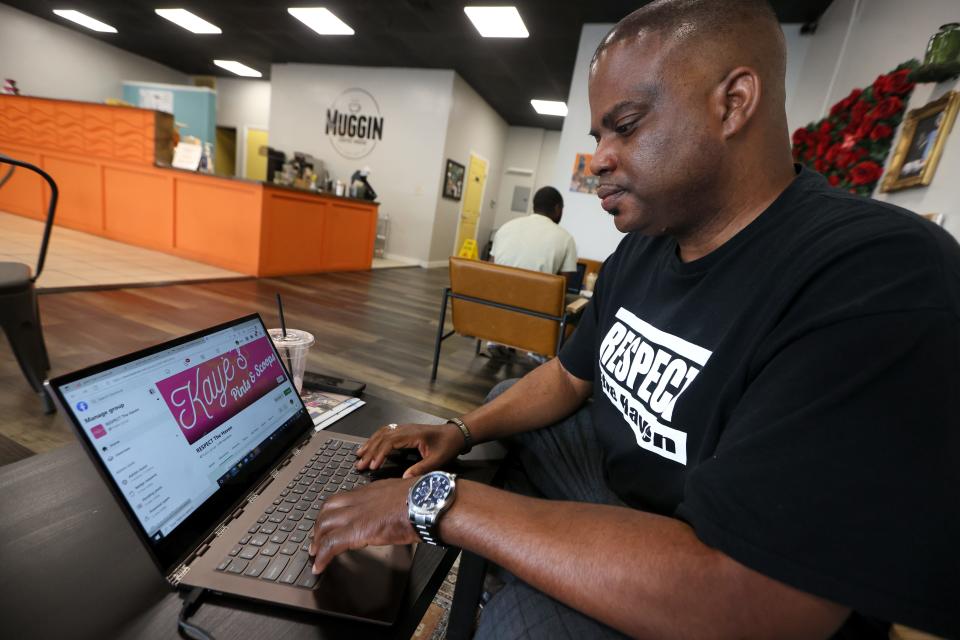 Jason Sharif, executive director of Respect the Haven, which champions Whitehaven's Black owned business, organizes community meet-ups and neighborhood beautification projects in the South Memphis neighborhood, sits inside Muggin Coffeehouse on Thursday, May 26, 2022. 
