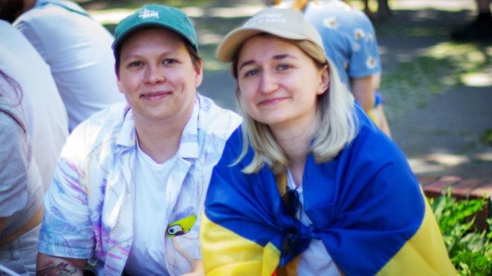 <div class="inline-image__caption"><p>“We're a couple actually. We are here to represent Ukraine—we are from Kyiv. We don't want people to forget that the war is happening. And one last thing: fuck the Russians.”</p><p>Ksenia Larima and Svetlana Palarchuk at Warsaw’s Parada Równości/Pride March</p></div> <div class="inline-image__credit">Courtesy of Randy R. Potts</div>