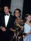 <p>Supermodel Iman accompanied Calvin Klein to the Met Gala wearing a shimmering gold gown he designed. </p>