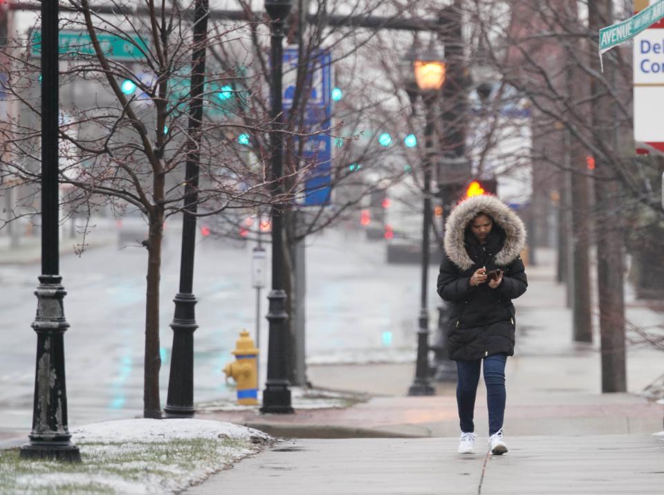 A pedestrian bundles up while walking along Lancaster Pike during a Wednesday morning nor'easter in March 2018.