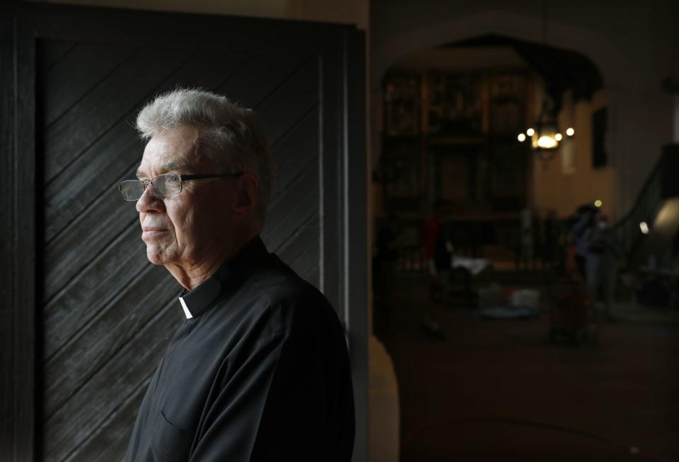 Father John Molyneux at the San Gabriel Mission.