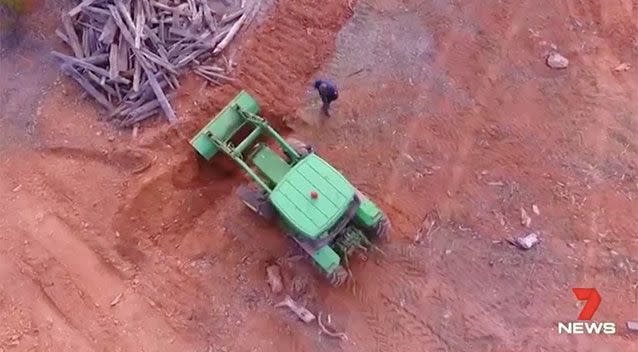 Excavators dig in an area of interest. Source: 7 News