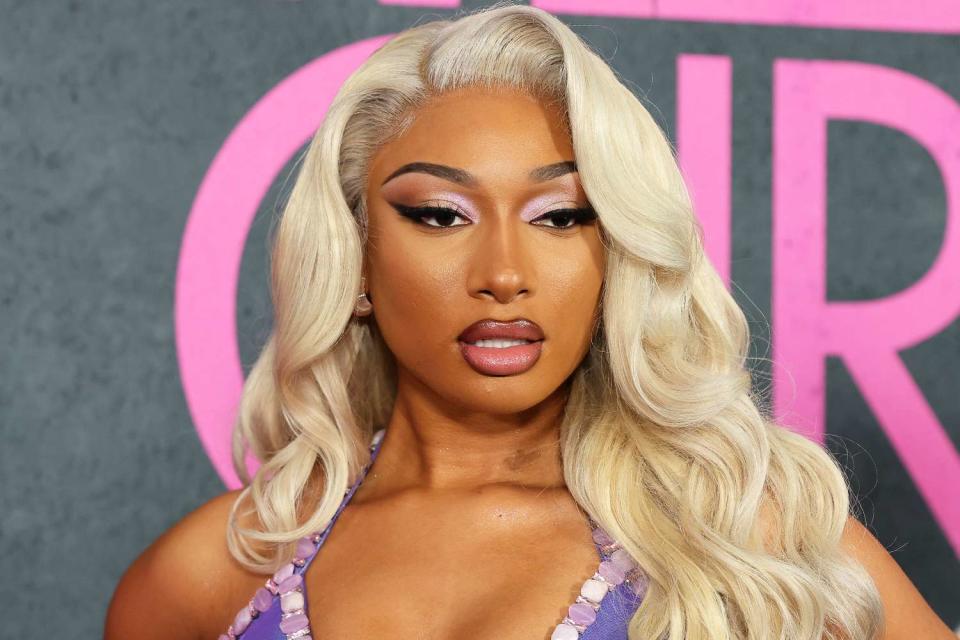 <p>Arturo Holmes/Getty</p> Megan Thee Stallion attends the "Mean Girls" premiere at AMC Lincoln Square Theater in January 2024 in New York City