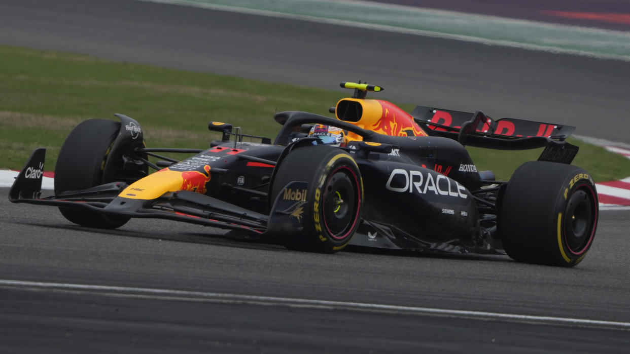 Red Bull driver Sergio Perez of Mexico steers his car during the Chinese Formula One Grand Prix at the Shanghai International Circuit, Shanghai, China, Sunday, April 21, 2024. (AP Photo/Andy Wong)