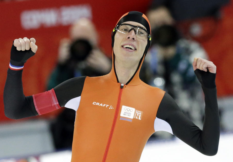 Gold medallist Jorrit Bergsma of the Netherlands celebrates after setting a new world record in the men's 10,000-meter speedskating race at the Adler Arena Skating Center during the 2014 Winter Olympics in Sochi, Russia, Tuesday, Feb. 18, 2014. (AP Photo/Matt Dunham)