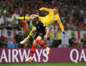<p>Jordan Pickford is fouled by Ante Rebic as both players go for the ball </p>