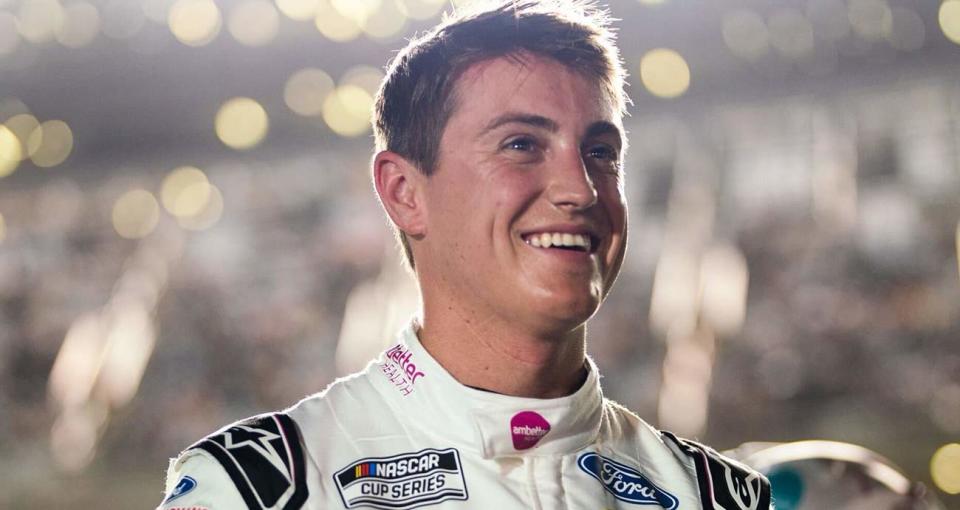 Zane Smith smiles on pit road after finishing eighth in Duel No. 1 at Daytona