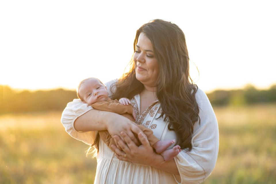 Heather Bradley cradles her new baby boy. 