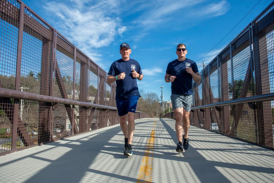 From left, Framingham Assistant Fire Chief John Schultz and firefighter Josh Prouty get in a training run on the Cochituate Rail Trail ahead of Monday's Boston Marathon. Schultz, who is running his third Marathon, is fundraising for Jewish Family Services of MetroWest. Prouty, who is running his first Marathon, is fundraising for the MetroWest ESL Fund. Both men are offering Framingham Fire Boston Marathon T-shirts to donors.