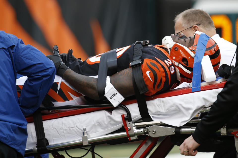 Cincinnati Bengals cornerback Tony McRae (29) is taken off the field after an injury in the second half of an NFL football game against the Cleveland Browns, Sunday, Nov. 25, 2018, in Cincinnati. (AP Photo/Frank Victores)