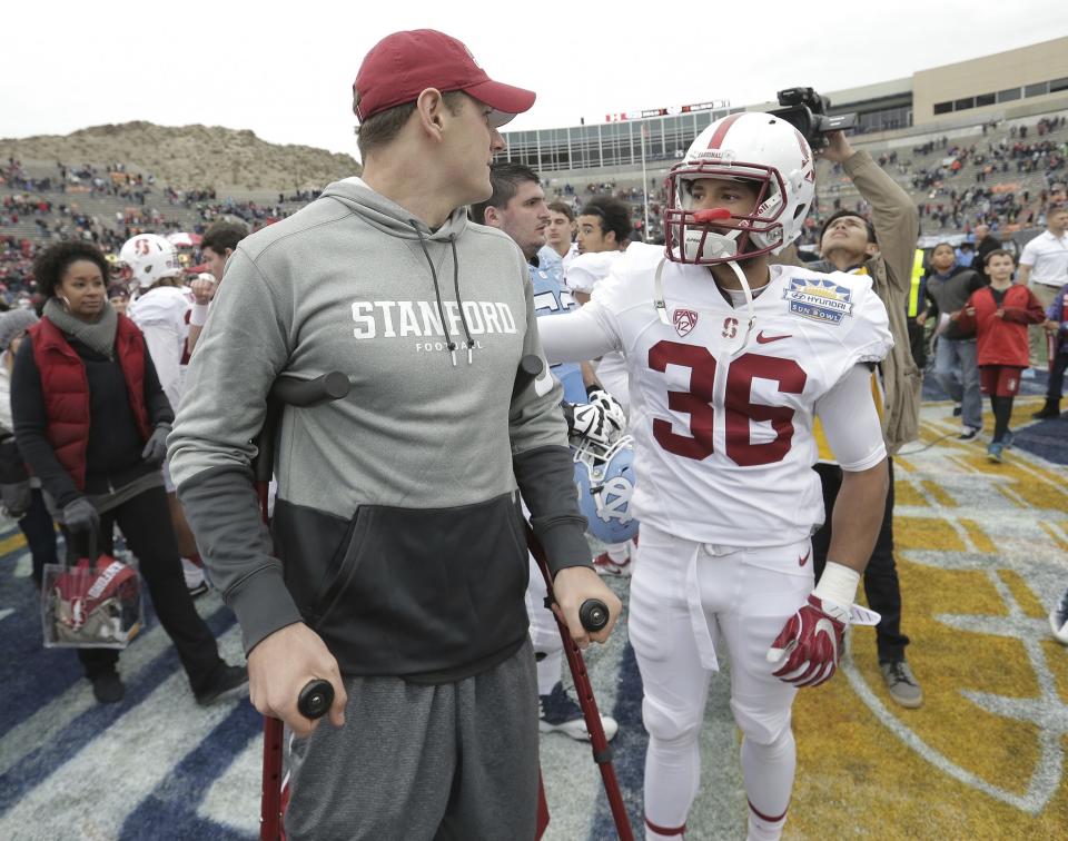 Stanford quarterback Keller Chryst. left, was injured in the Sun Bowl. (AP Photo/Mark Lambie)