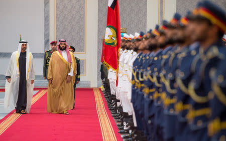 Abu Dhabi's Crown Prince Sheikh Mohammed bin Zayed al-Nahyan receives Saudi Arabia's Crown Prince Mohammed bin Salman Al Saud in Abu Dhabi, UAE, November 22, 2018. Picture taken November 22, 2018. Bandar Algaloud/Courtesy of Saudi Royal Court/Handout via REUTERS