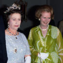 <p>The Queen and prime minister Margaret Thatcher attend a ball to celebrate the Commonwealth Heads of Government Meeting hosted on 1 August 1979 in Lusaka, Zambia. (Getty Images)</p> 
