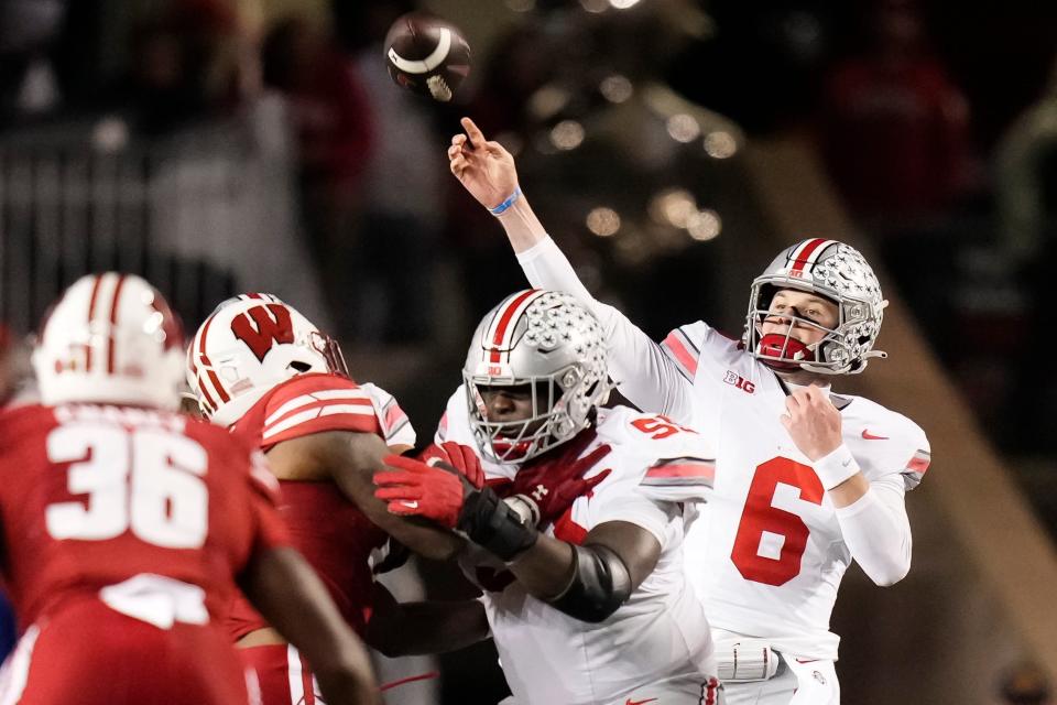 Ohio State Buckeyes quarterback Kyle McCord (6) throws a pass Saturday against the Wisconsin Badgers. Ohio State on , 24-10.