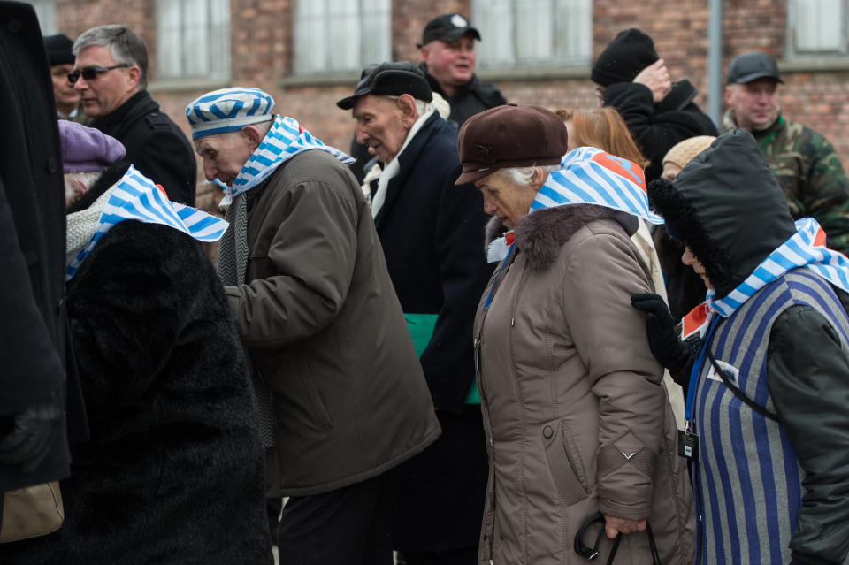 Auschwitz survivors visit the execution wall on January 27, 2015 in Oswiecim, Poland. International heads of state, dignitaries and over 300 Auschwitz survivors are attending the commemorations for the 70th anniversary of the liberation of Auschwitz by Soviet troops on 27th January, 1945. Auschwitz was among the most notorious of the concentration camps run by the Nazis during WWII and whilst it is impossible to put an exact figure on the death toll it is alleged that over a million people lost their lives in the camp, the majority of whom were Jewish.