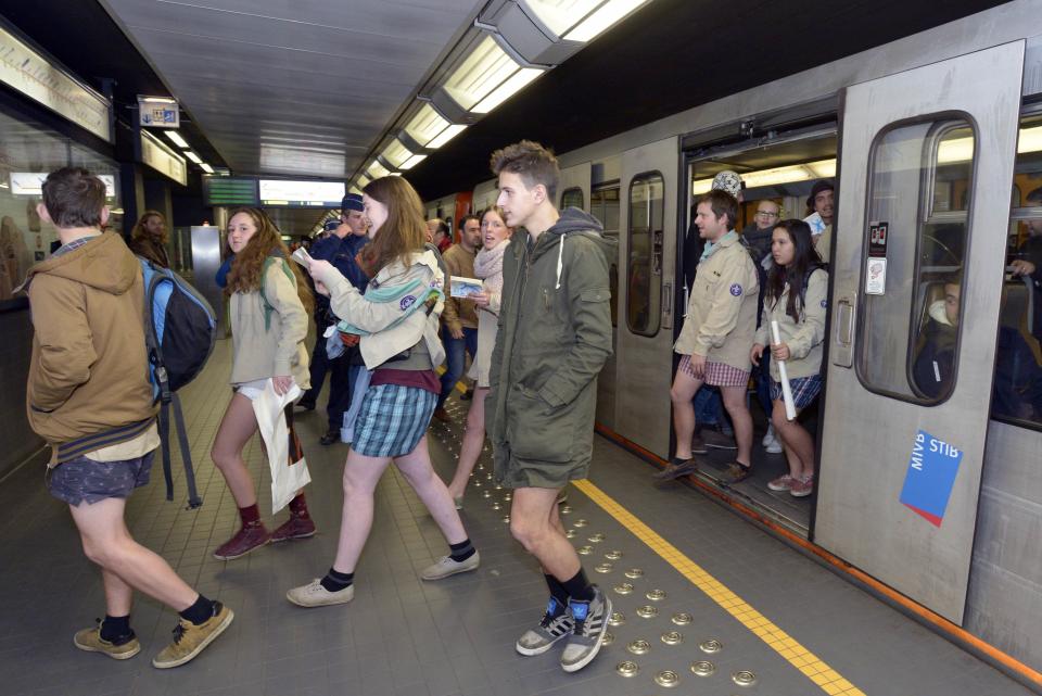 People take part in the annual "No Pants Subway Ride" in the subway in Brussels