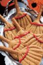 <p>All you need to make these cookies is peanut butter cookie dough, red frosting, and a fork to make the lines on the broom. </p><p><strong><em><a href="https://www.womansday.com/food-recipes/food-drinks/a28860048/broom-cookies-recipe/" rel="nofollow noopener" target="_blank" data-ylk="slk:Get the Broom Cookies recipe.;elm:context_link;itc:0;sec:content-canvas" class="link ">Get the Broom Cookies recipe. </a></em></strong></p>