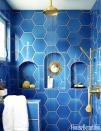 <p>Shampoo storage never looked so chic. In Justina Blakeney's <a href="https://www.housebeautiful.com/design-inspiration/house-tours/g3610/justina-blakeney-jungalow-tour/" rel="nofollow noopener" target="_blank" data-ylk="slk:"Jungalow,";elm:context_link;itc:0;sec:content-canvas" class="link ">"Jungalow,"</a> the shower's niche is inset with a vintage mirror. This blue and gold color combo will make a morning shower even more energizing, too. </p>