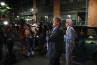 Michel Platini and his lawyer William Bourdon, right, answer reporters after Platini has been freed, outside the French police anti-corruption and financial crimes office in Nanterre, outside Paris, early Wednesday, June 19, 2019. Former UEFA president Michel Platini proclaimed his innocence during police questioning Tuesday following his arrest as part of a corruption probe into the vote that gave the 2022 World Cup to Qatar. (AP Photo/ Francois Mori)